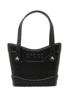 Black plastic tote bag with rounded shape, features holes for ventilation, logo detail, and sturdy handles. Textured base for grip.