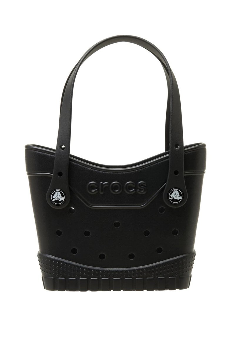 Bolsa de plástico negro de forma redondeada, cuenta con agujeros para ventilación, detalle de logo y asas resistentes. Base texturizada para un mejor agarre.