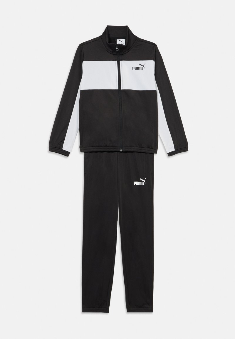 Μαύρο και άσπρο tracksuit Puma που περιλαμβάνει τζάκετ με φερμουάρ, ψηλό γιακά, μακρυά μανίκια και αντίστοιχα παντελόνια με ελαστική μέση.