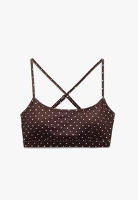 Brązowy biustonosz typu bralette w grochy z cienkimi ramiączkami, z krzyżującym się wzorem z tyłu i gładką, elastyczną fakturą.