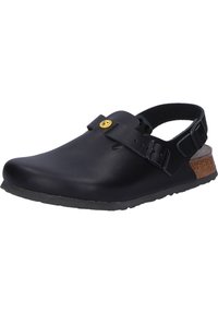 Black clog style shoe with adjustable strap, made from smooth material, featuring a cork footbed and textured rubber outsole. Gold logo detail.