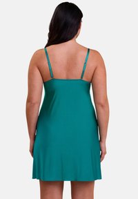 Teal sleeveless dress with thin adjustable straps; smooth, lightweight fabric; above-the-knee length; simple design; no visible patterns or accents.