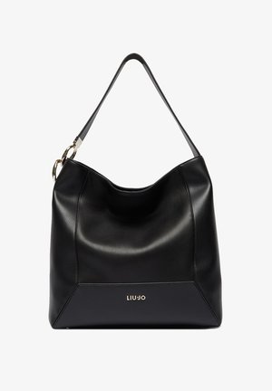 Sac à main en cuir noir à texture lisse, design souple, et une seule bandoulière. Détail logo en ton or sur le devant.