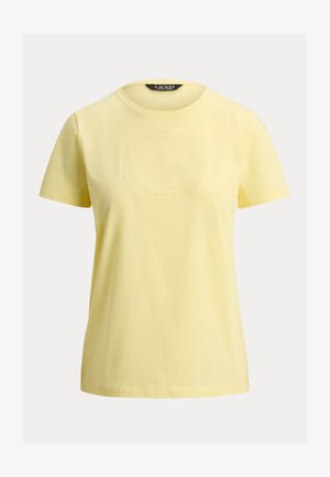 Geltona trumpomis rankovėmis medvilninė marškinėliai su apvalia iškirpte ir subtiliu įspaudžiu apvaliu logotipu ant krūtinės, pažymėti Lauren Ralph Lauren.