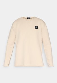 Unselected, cream