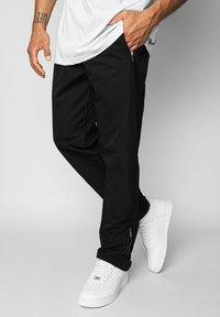 Dropsize WIDE - Tracksuit bottoms - black