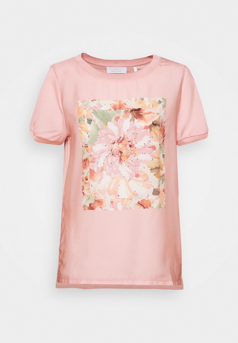 Rosa Kurzarmhemd mit Puffärmeln und großem Blumenaquarelldruck sowie kleinen goldenen Nieten in der vorderen Mitte.