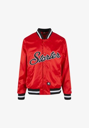 Vörös selyem bomber dzseki fekete "Starter" logóval, fekete-fehér csíkos mandzsettákkal és aljjal, valamint patentos záródással.