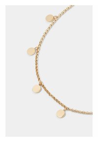 Goldkettchen mit runden, flachen Anhängern, die gleichmäßig entlang der feinen Gliederkette verteilt sind. Glatte, glänzende Oberfläche mit minimalistischem Design.