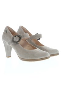Beige suede high-heeled shoes with a rounded toe, adjustable ankle strap, and decorative silver buckle on the strap.