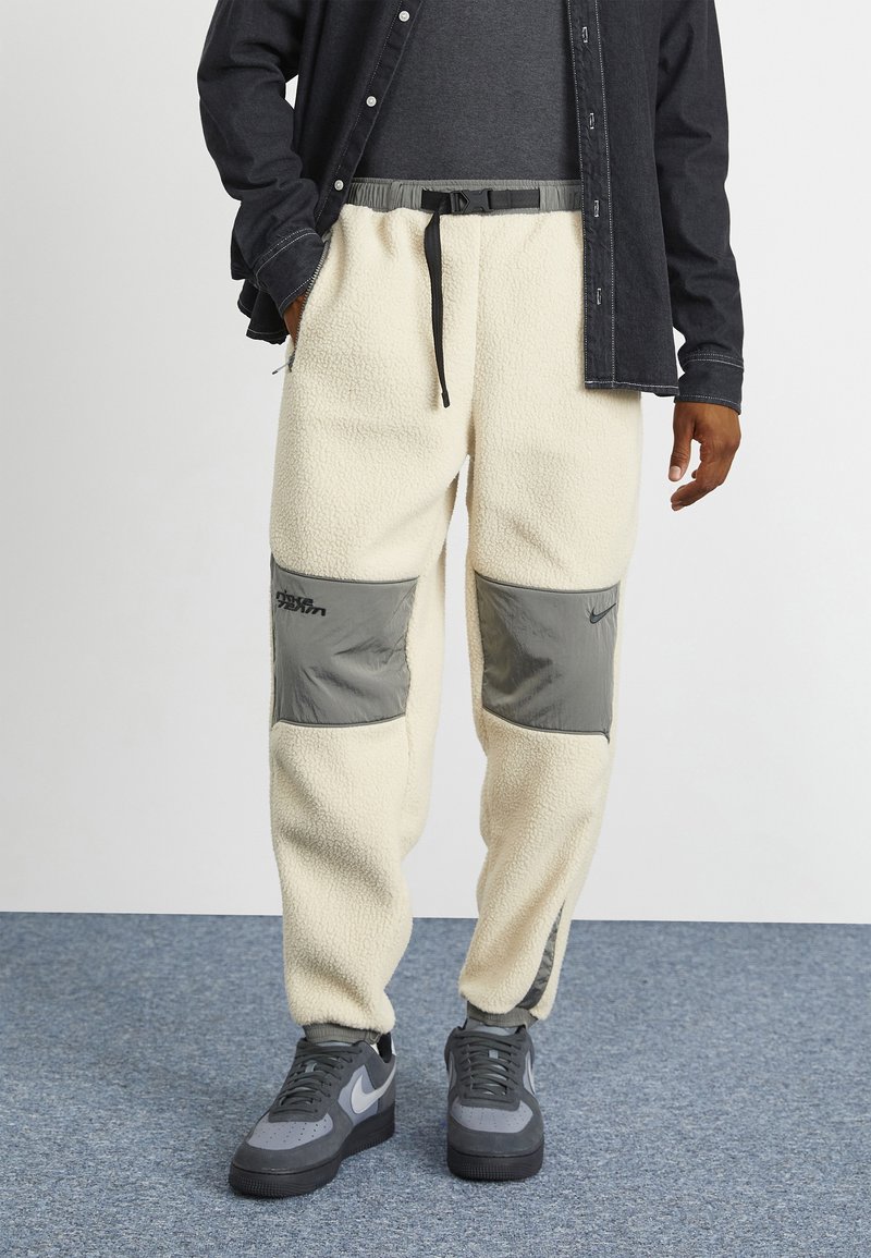 Nike Sportswear TREND WINTER Tracksuit bottoms flat pewter