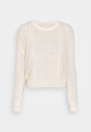 White knitted long-sleeve sweater with textured openwork patterns and ribbed cuffs and hem, displayed on a plain background.