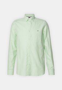 Mintgroene langemouwen shirt van katoen met een button-down kraag, voorzien van een klein logo op de borst en witte knopen.