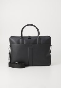 Black leather laptop bag with dual top handles, silver-tone hardware, and a detachable shoulder strap; features a zip closure and front branding.