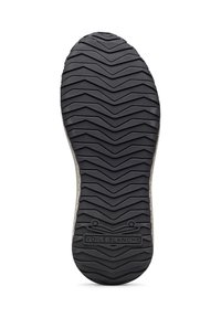 Suela de zapato con una superficie de caucho negro texturizada que presenta un patrón de banda de rodadura en zigzag, etiquetada "VOILE BLANCHE" en el centro inferior.