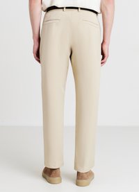 Calliope CON PINCES - Stoffhose - beige