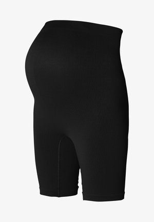 Shorts noirs côtelés avec une taille haute, un design arrivant aux genoux et une texture lisse, présentant un panneau ouvert à l'arrière.