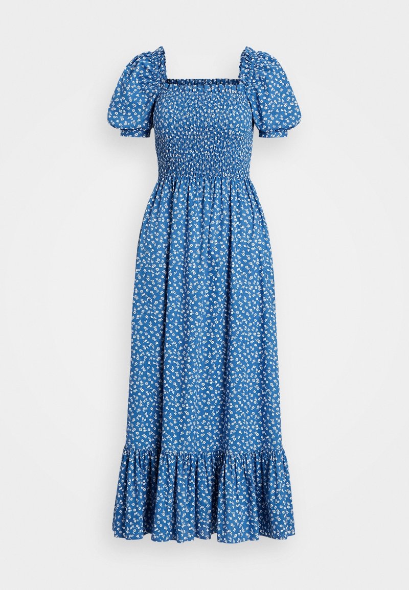 Robe midi bleue à imprimé floral blanc, col carré smocké, manches courtes bouffantes, taille cintrée et ourlet à volants.