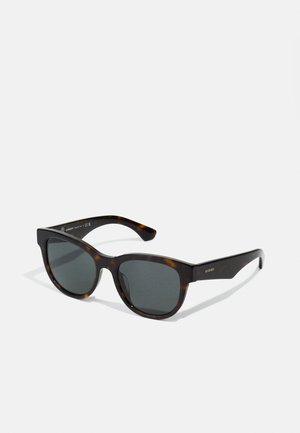 Tortoiseshell sunglasses with rectangular shape, dark gray lenses, and thick, smooth plastic frames. Features simple branding on the arm.