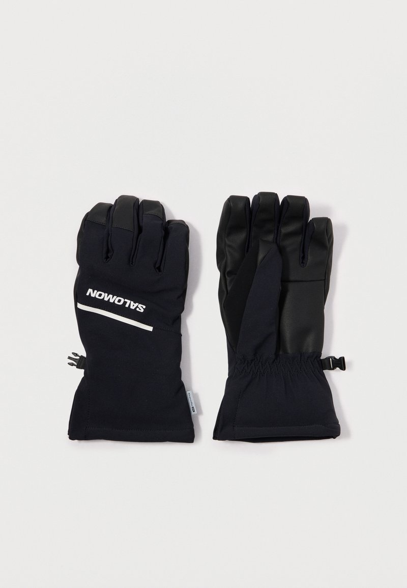 Svarta handskar med en texturerad, vattentät yta, justerbara manchetter och en vit logotyp. Tillverkade av en blandning av mjuka och hållbara material.