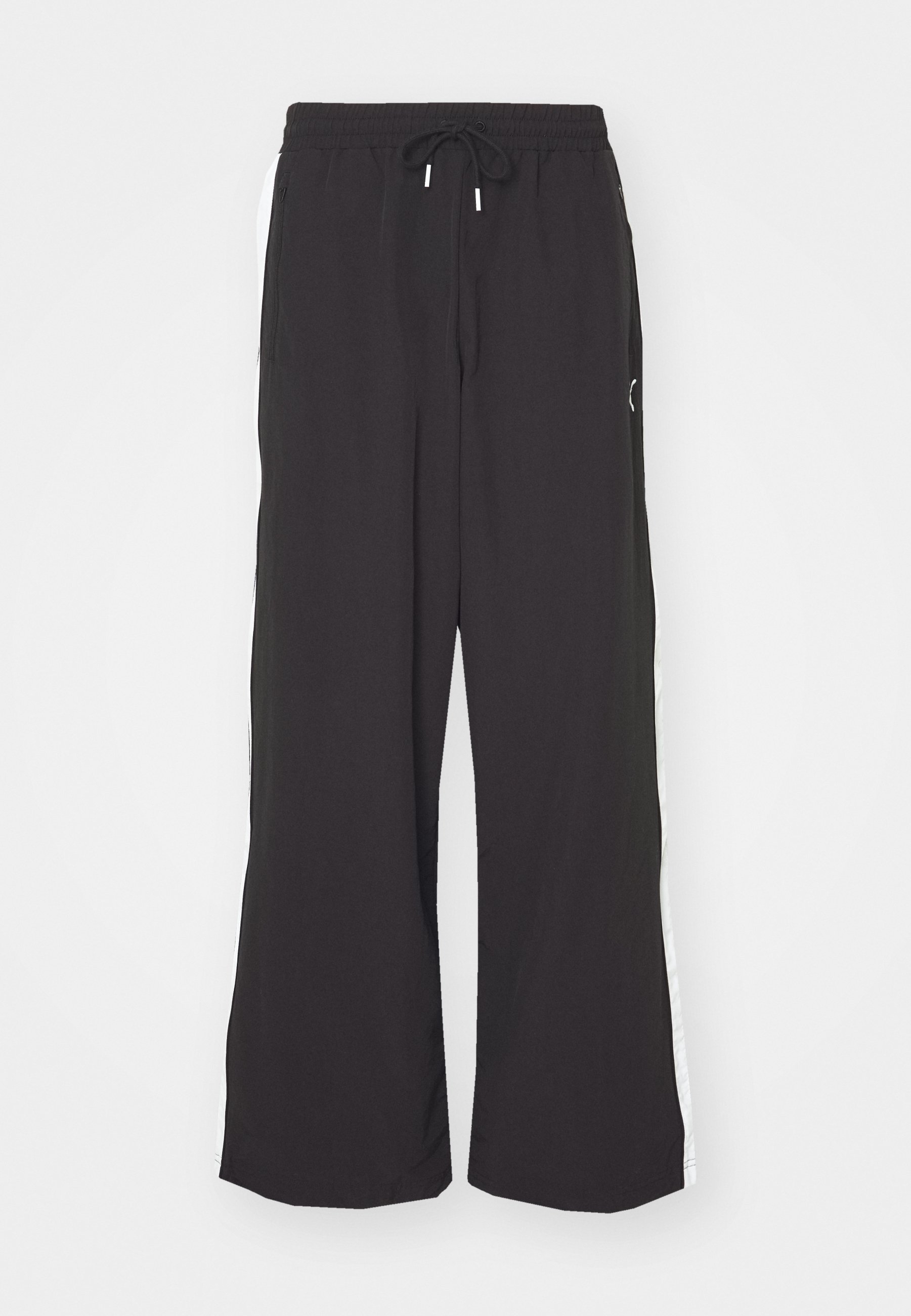 Puma OVERSIZED TRACK PANTS UNISEX - Pantalones deportivos - black
