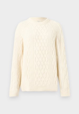Pull en maille torsadée couleur crème avec manches longues et col rond, poignets et ourlet côtelés.