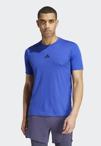 adidas Performance POWER WORKOUT - T-shirt till träning - semi lucid blue black