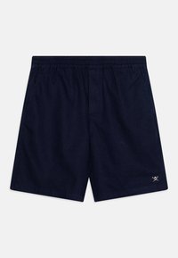 Pantaloni shorts blu navy con cintura elasticizzata, dotati di tasche laterali e un piccolo logo sul bordo inferiore. Tessuto dalla superficie liscia.