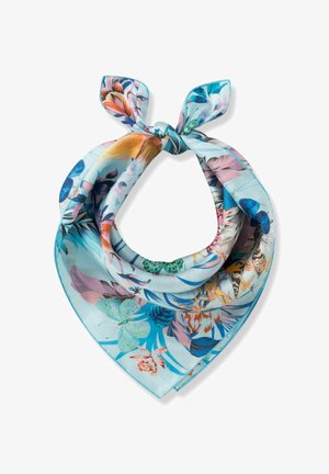 Light blue silk scarf with a tropical floral and butterfly pattern, tied in a loose knot.