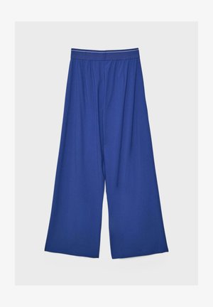 Pantalon bleu à jambes larges avec taille élastique et tissu lisse, présenté sur un fond blanc.