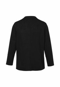 Zwarte jacket met lange mouwen van zachte stof, met een klassieke kraag en een rechte snit met zijslits. De achterkant toont minimale details.