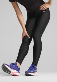 Puma RUN ULTRAFORM HW FL TIGHT W - Leggings - black