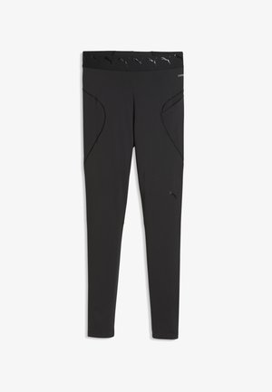 Leggings de sport noirs Puma avec taille haute, arborant des logos Puma et des détails de coutures de contour sur les hanches et les jambes.