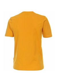 Kortærmet t-shirt i lys gul, lavet af bomuld, med en rund hals og en glat overflade. Ingen synlige logoer eller mønstre.