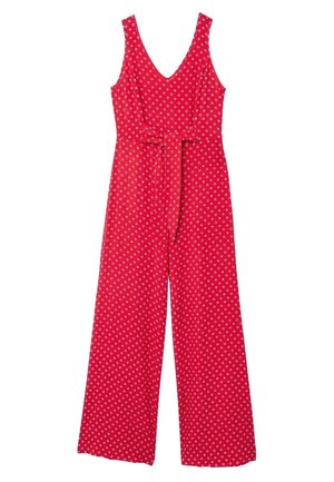 Punainen hihaton haalari, jossa syvä V-pääntie, väljä istuvuus ja leveät lahkeet. Vyötäröllä vyö, ja pienikokoinen sinivalkoinen kukkakuosi.