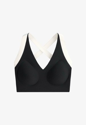 Black sports bra with molded cups and wide white crisscross straps on the back, designed for support and comfort.