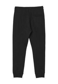 Schwarze Jogginghose aus weichem Stoff, mit tailliertem Bein, elastischem Bund und einer einzelnen Gesäßtasche.