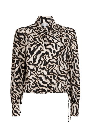 Kraagloze blouse in zwart en crèmekleurig dierenprint, gemaakt van lichte stof. Heeft een kraag, strikdetail en elastische manchetten.