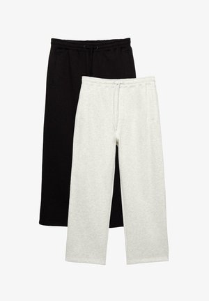 Twee paar casual sweatpants, één zwart en één lichtgrijs, beide met elastische taillebanden met koord en zijzakken.