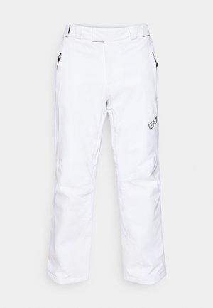 Pantalones de nieve blancos hechos de material impermeable, con un corte recto, dos bolsillos con cremallera y un logo bordado en el costado.
