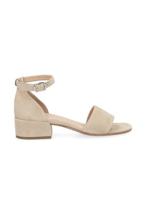 Sandale pour femmes en daim beige avec talon bloc, bride à la cheville et design à bout ouvert sur fond blanc.