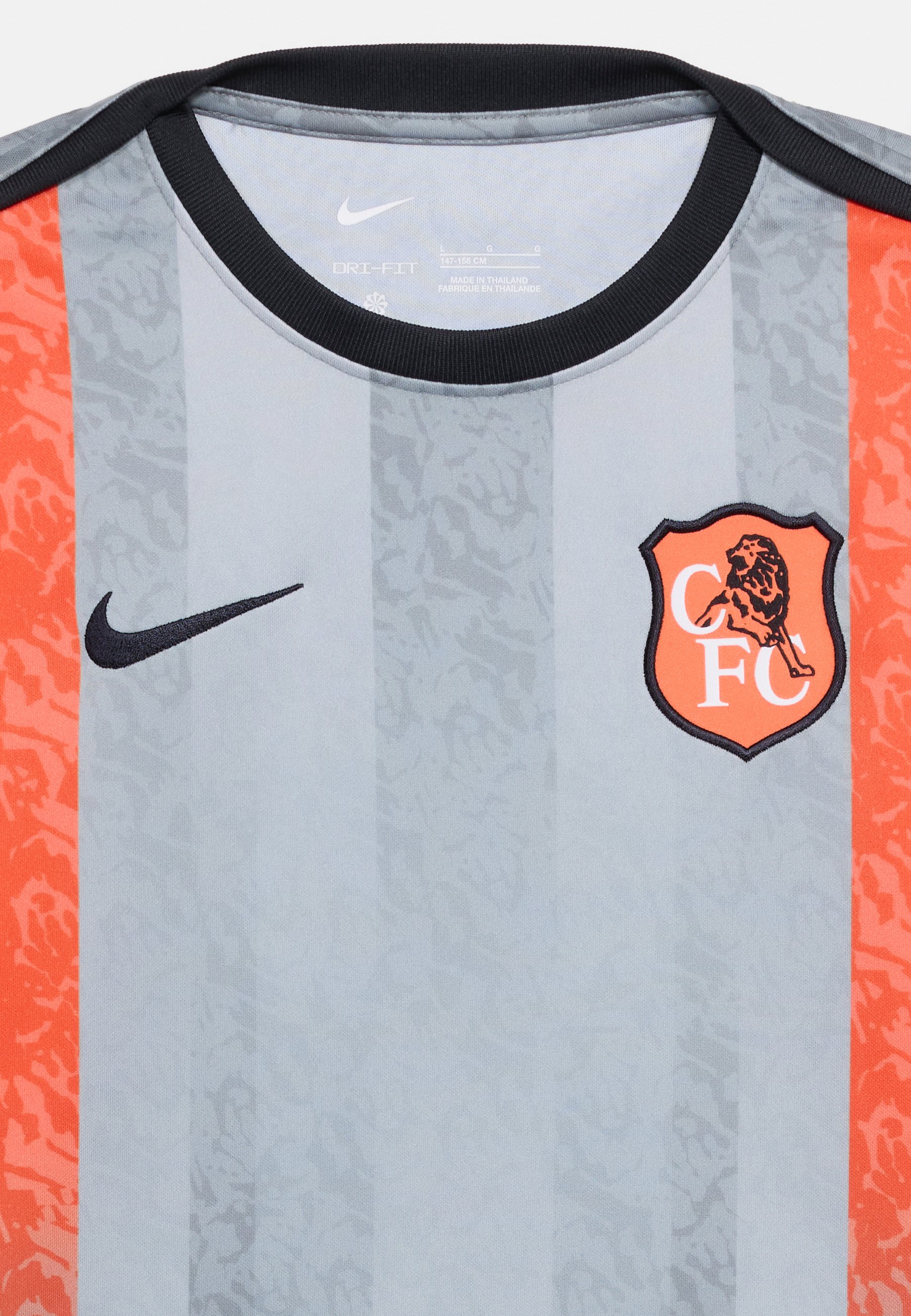 orange and gray nike shirt