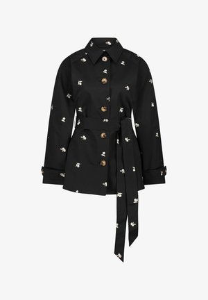 Black jacket with floral embroidery, feature large brown buttons, a tie belt, and a structured collar. Long sleeves with buttoned cuffs.