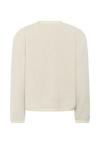 Fleece-Sweatshirt in Hellbeige mit weicher Textur, langen Ärmeln und kontrastierendem gelben Abschluß am Kragen und den Bündchen.