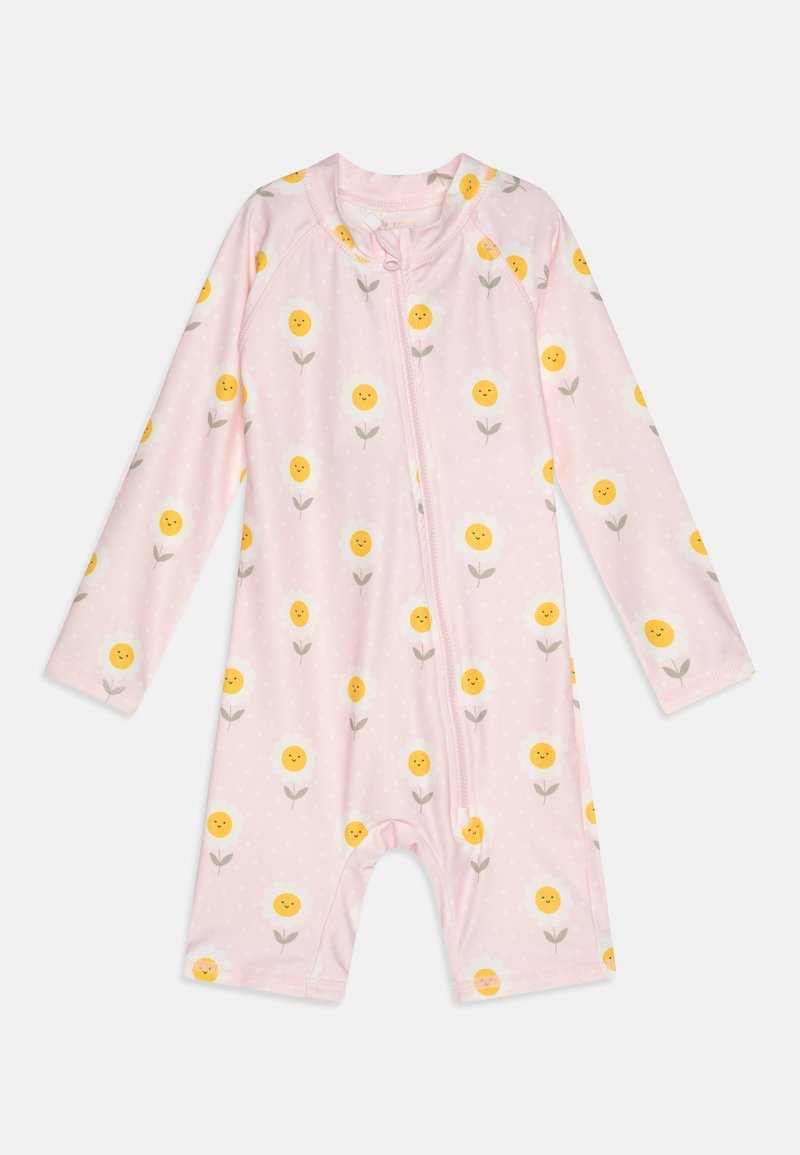 Rosa langermet romper med glidelås, prydet med gule smilende blomster med grønne stilker på en hvit prikkete bakgrunn.