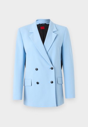 Lyseblå dobbeltknappet blazer med notched lapels, to forlommer og sorte knapper, med sort indvendig foer.
