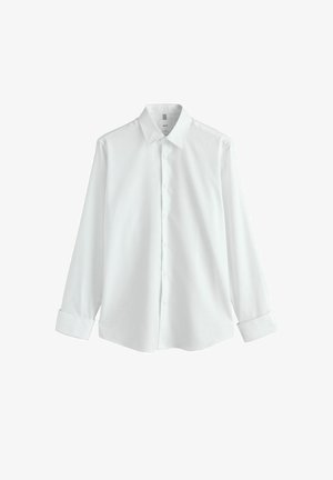 Cămașă albă cu mâneci lungi, nasturi și guler ascuțit, împreună cu manșetele, afișată întinsă pe un fundal alb.