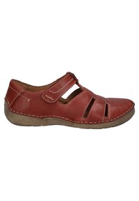 Red leather shoe with cut-out design, Velcro strap, and beige outsole. Features detailed stitching along the edges for added texture.