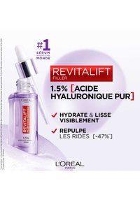 Sérum Revitalift de L'Oréal dans un flacon en verre transparent avec une teinte violette et un compte-gouttes argenté, étiqueté avec de l'acide hyaluronique et ses bienfaits.