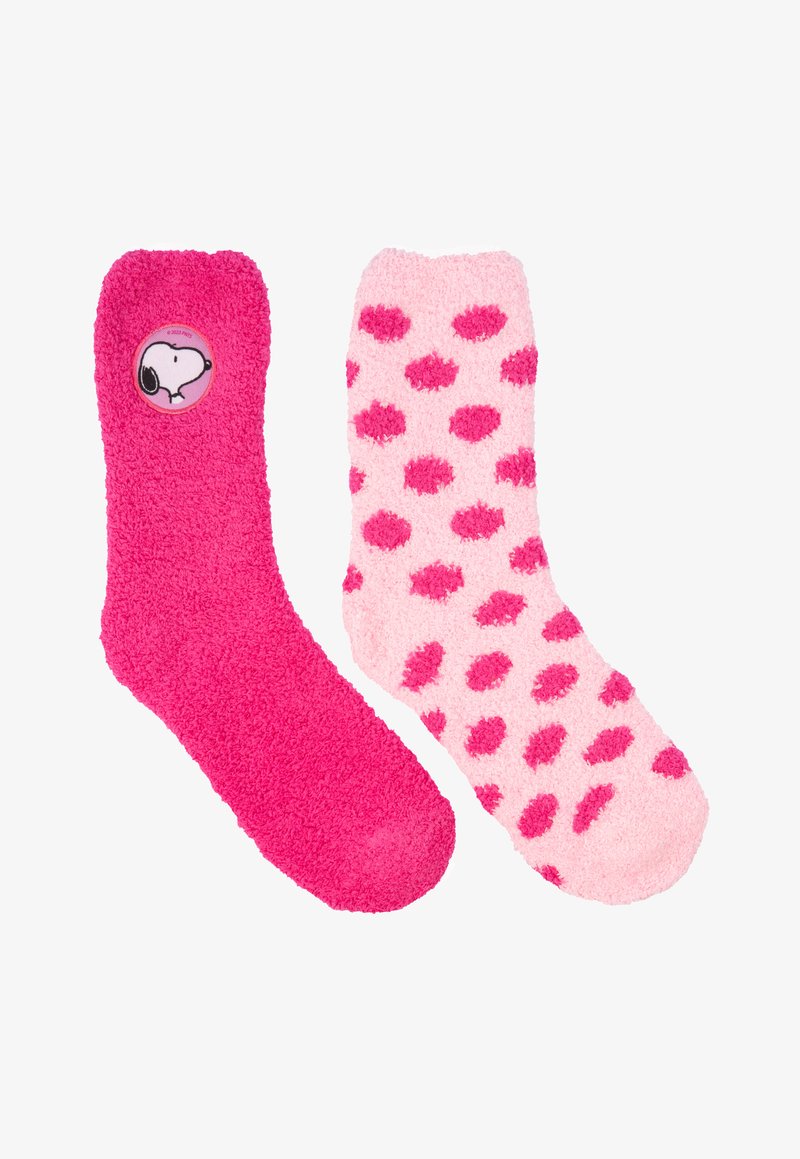 Set di calzini pelosi composto da un calzino solido rosa acceso con un design di Snoopy e un altro calzino rosa chiaro con pois rosa scuro.